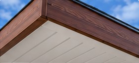Wood-effect fascia and white soffit